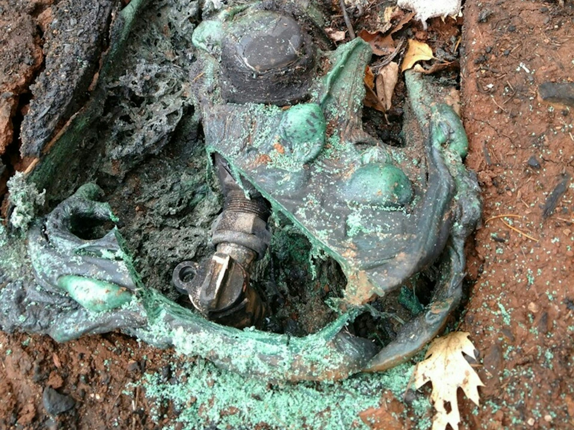 A fire melted the plastic cover of a water meter A fire melted the plastic cover of a water meter