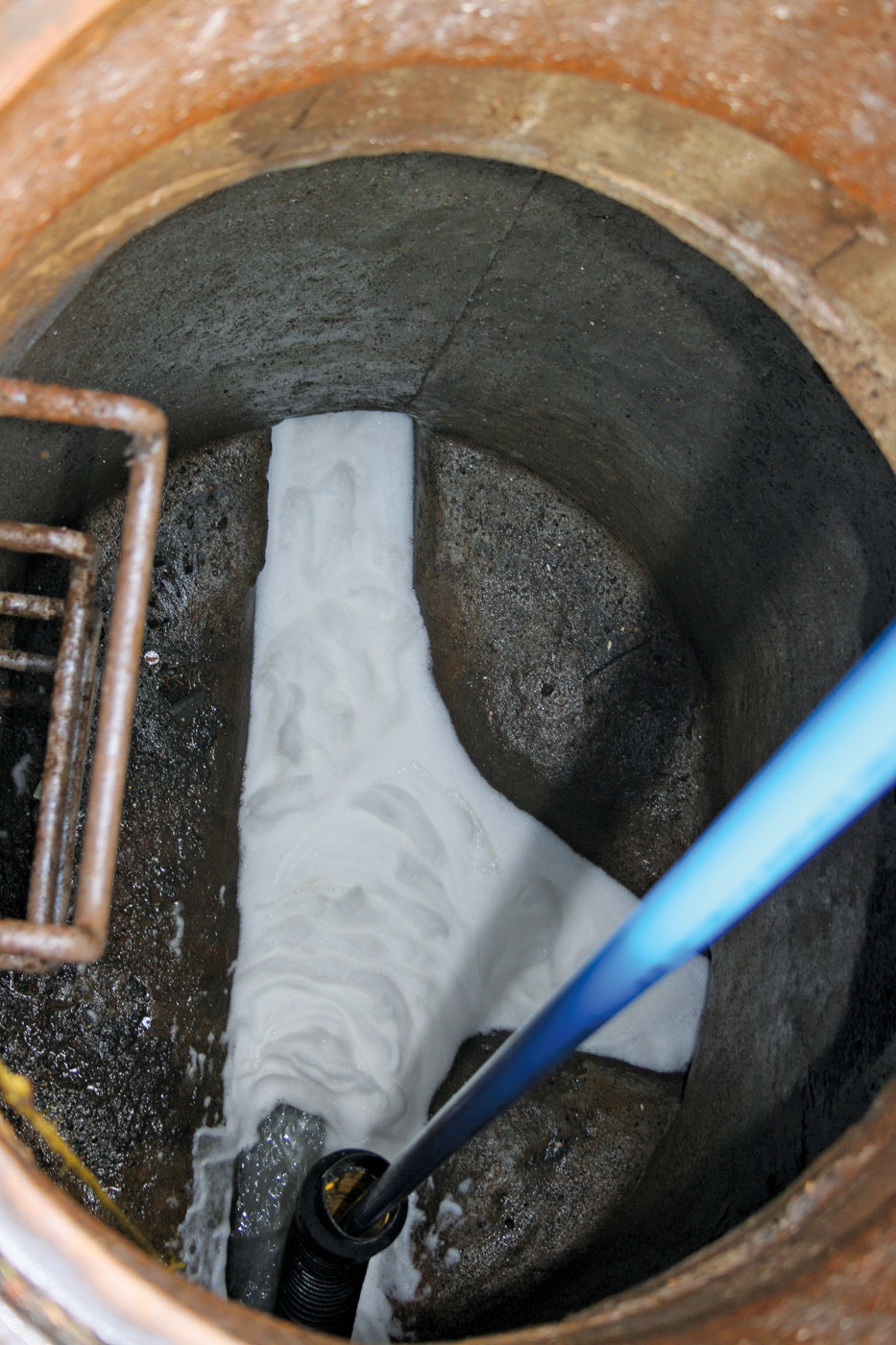 Manhole Root Control Cutting Intrusions and Overflows | Municipal Sewer and Water