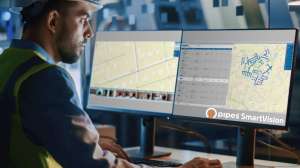Desk Man with Smart Vision Logo