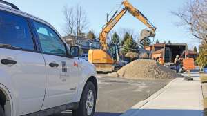Construction Job Site Overview With City Of Hamilton Vehicle