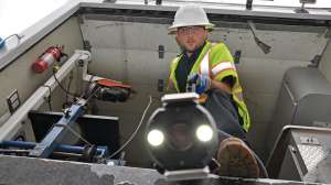 Jake Zeiger Prepares To Lower An Inspection Camera Into A Manhole