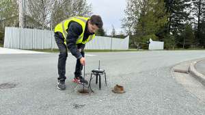 Nick Druyvestein Lowers Sensor Onto Mainline Valve
