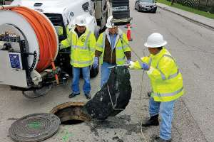 Utility Climbs Back After Hurricane Harvey