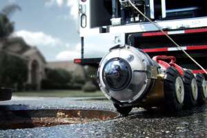 Duc on street at manhole on pipe ranger 200429 123041