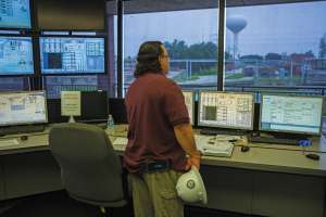 Utility Climbs Back After Hurricane Harvey
