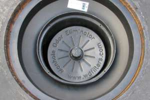 Manhole odor eliminator moe