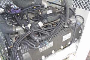 Combination truck offers cost-saving auxiliary gasoline engine