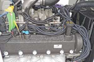 Combination truck offers cost-saving auxiliary gasoline engine