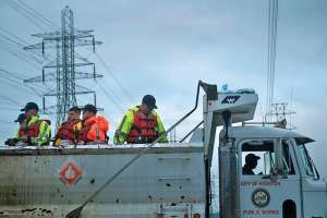 Utility Climbs Back After Hurricane Harvey