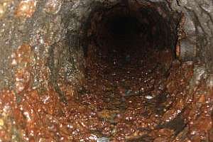 True Grit: Using Dry Abrasives to Scour Pipe